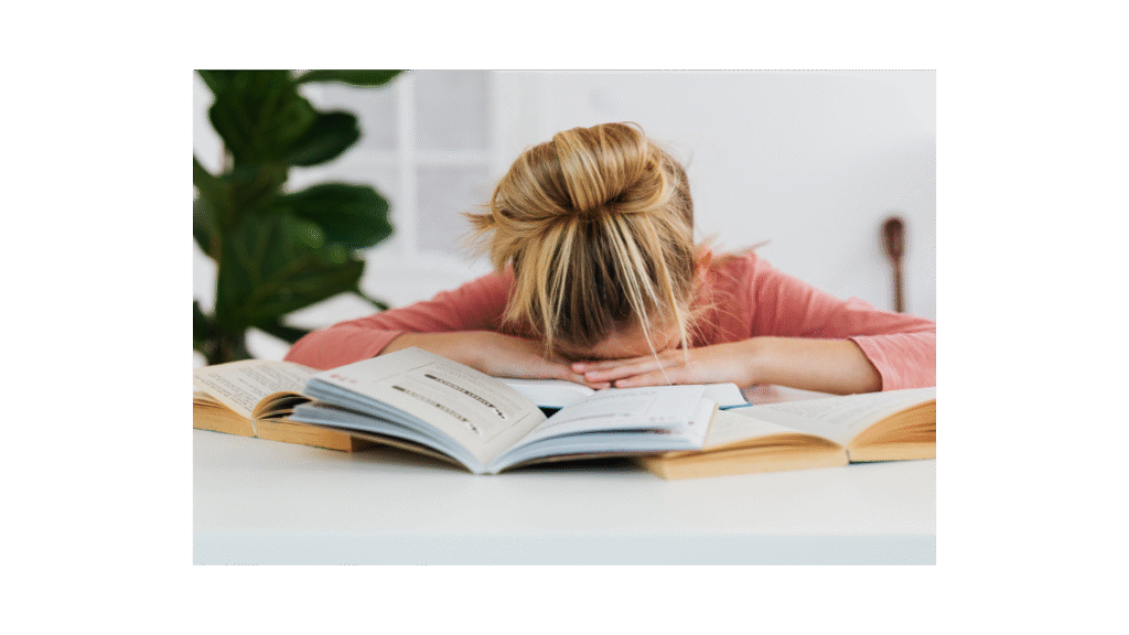 Procrastination lady head in pile of books