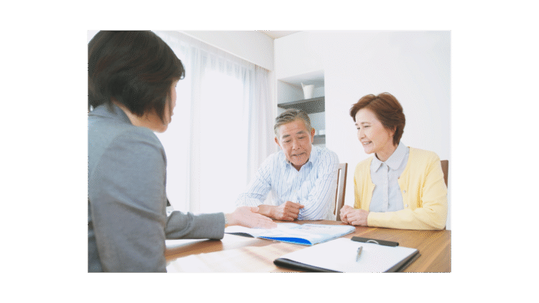 A retirement coach with a man and wife couple