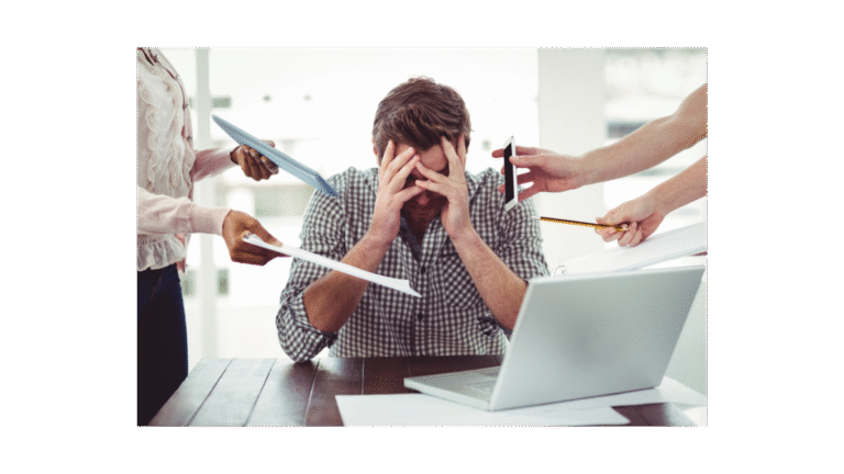 A man at work stresses with his laptop and lots of people handing him things