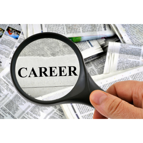 Looking through a magnifying glass at Career