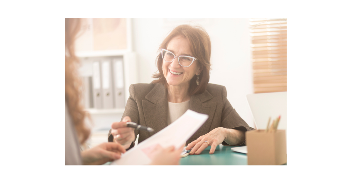 Life Coach going through some paperwork